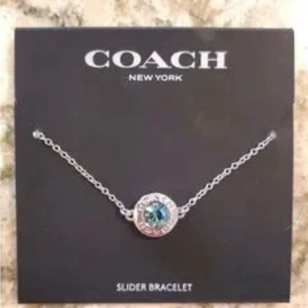 Coach Silver and Blue Charm Bracelet